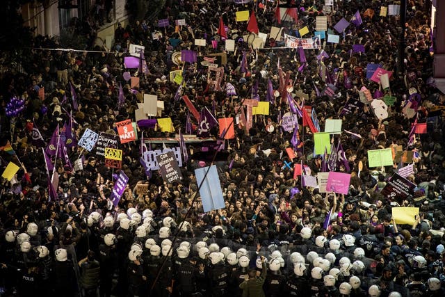 Police move to disperse thousands of women attempting to march down Istanbul's famous Istiklal street.