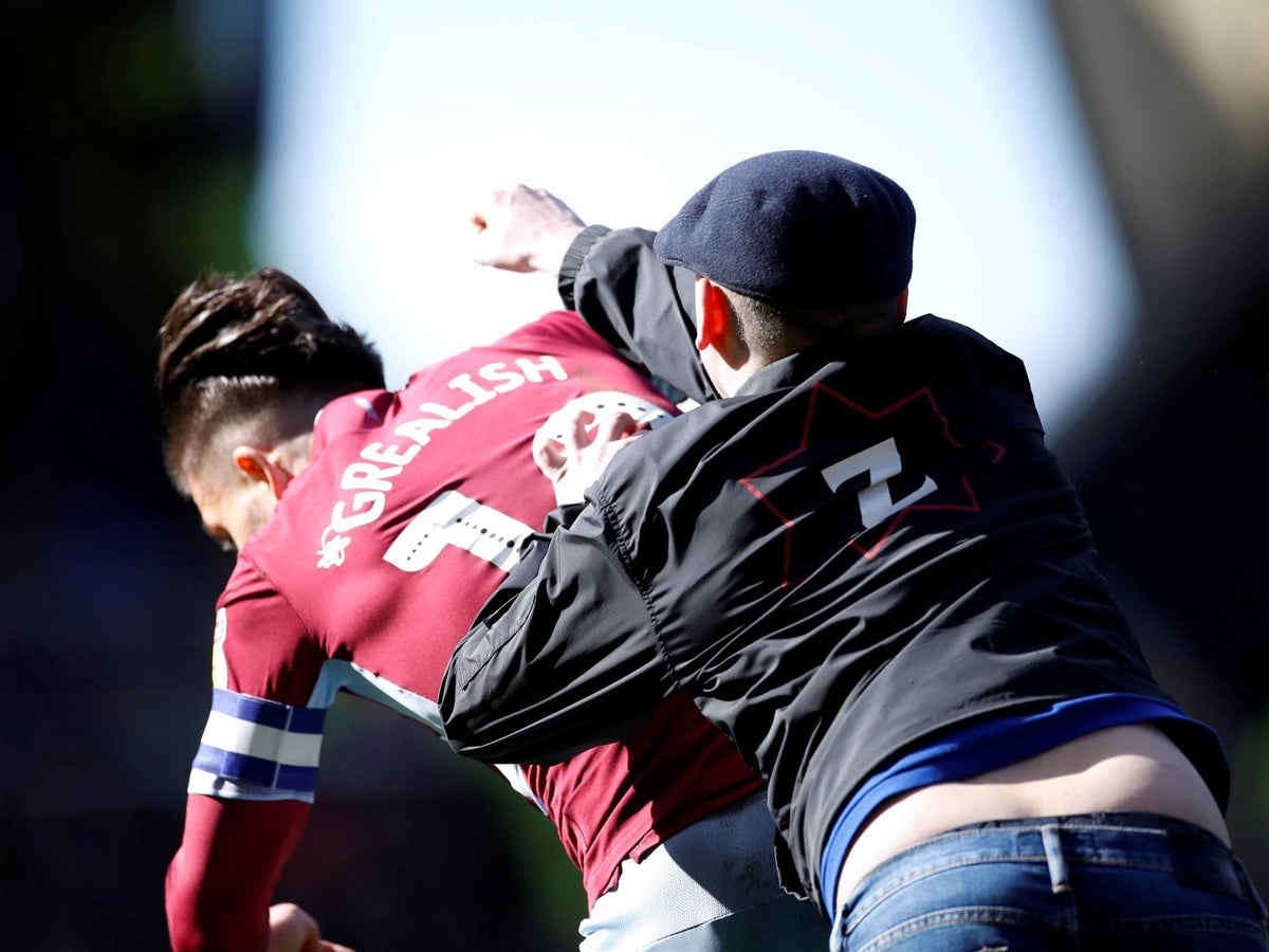 Birmingham City fan who allegedly attacked Jack Grealish due in court after being by police | The Independent | The Independent