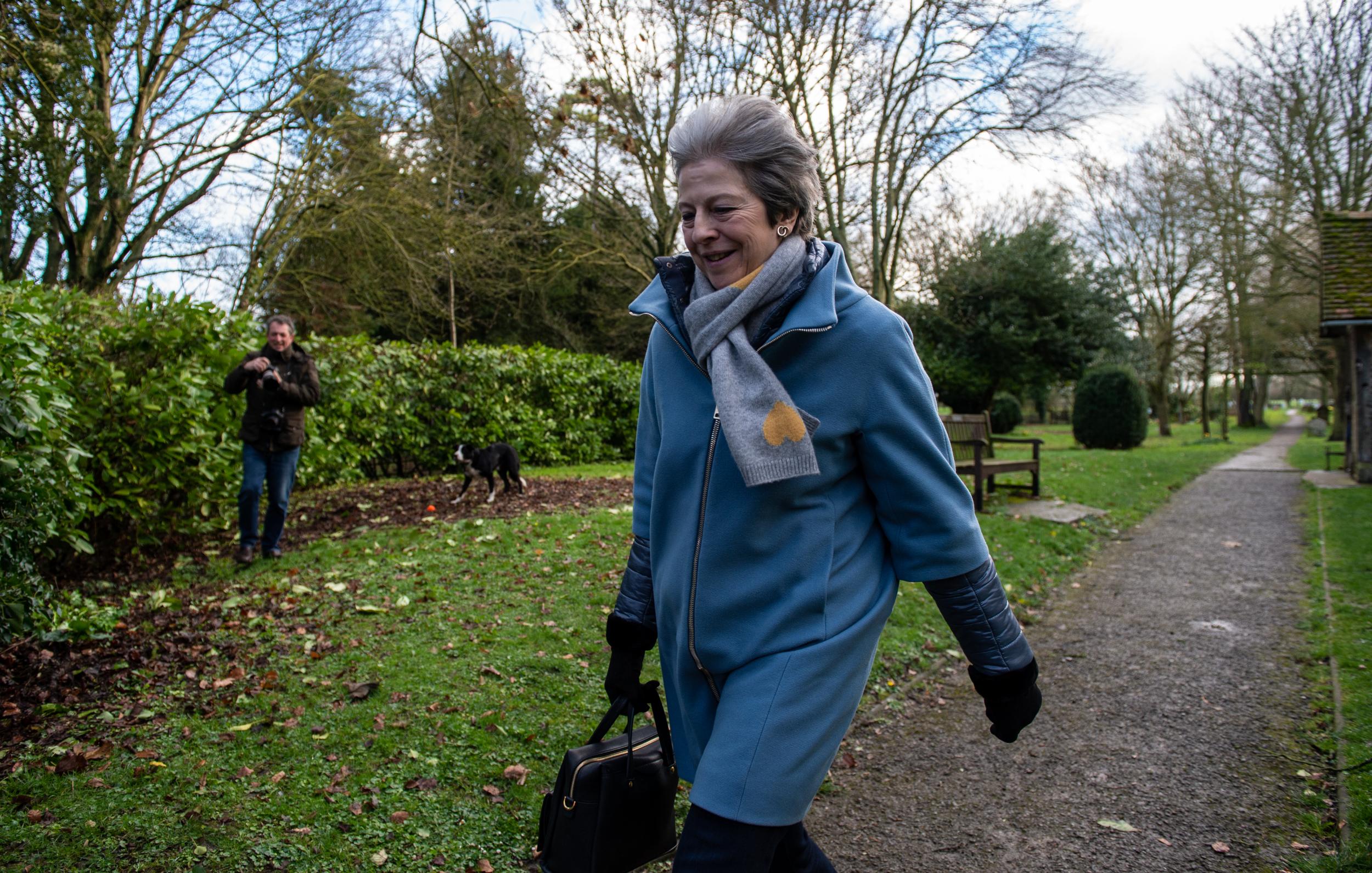Theresa May and her husband Philip May leave after attending a church service on 10 March