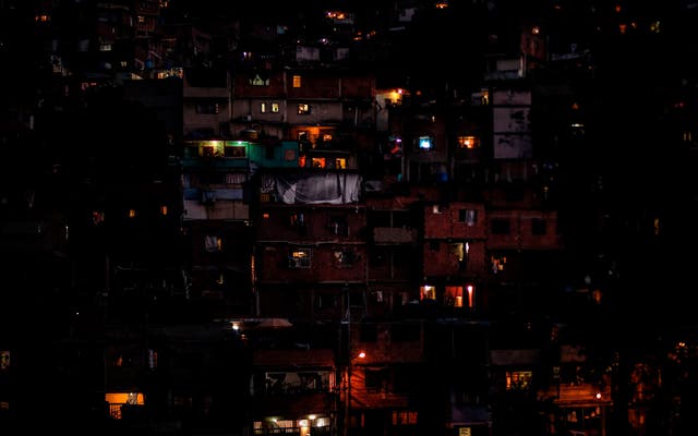 Electricity has been restored to some parts of the capital, but millions of Venezuelans remain without power
