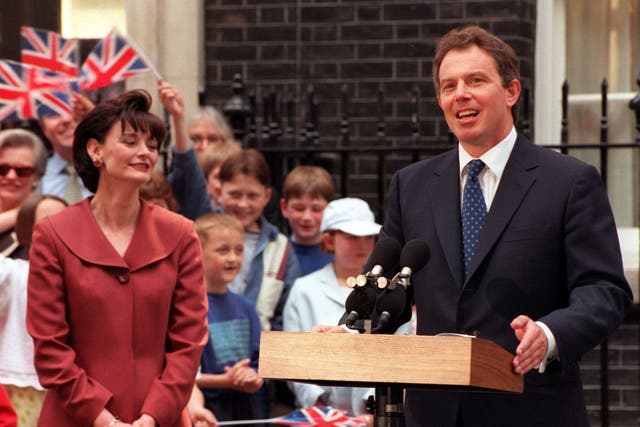 Cherie Blair looks on as her husband addresses the nation as prime minister in 1997