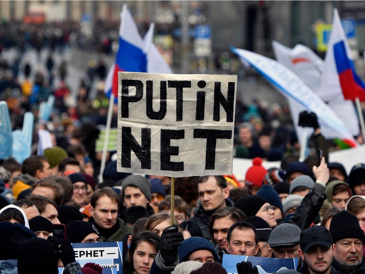 A protester holds a placard reading during an opposition rally in central Moscow, on 10 March, 2019, to demand internet freedom in Russia