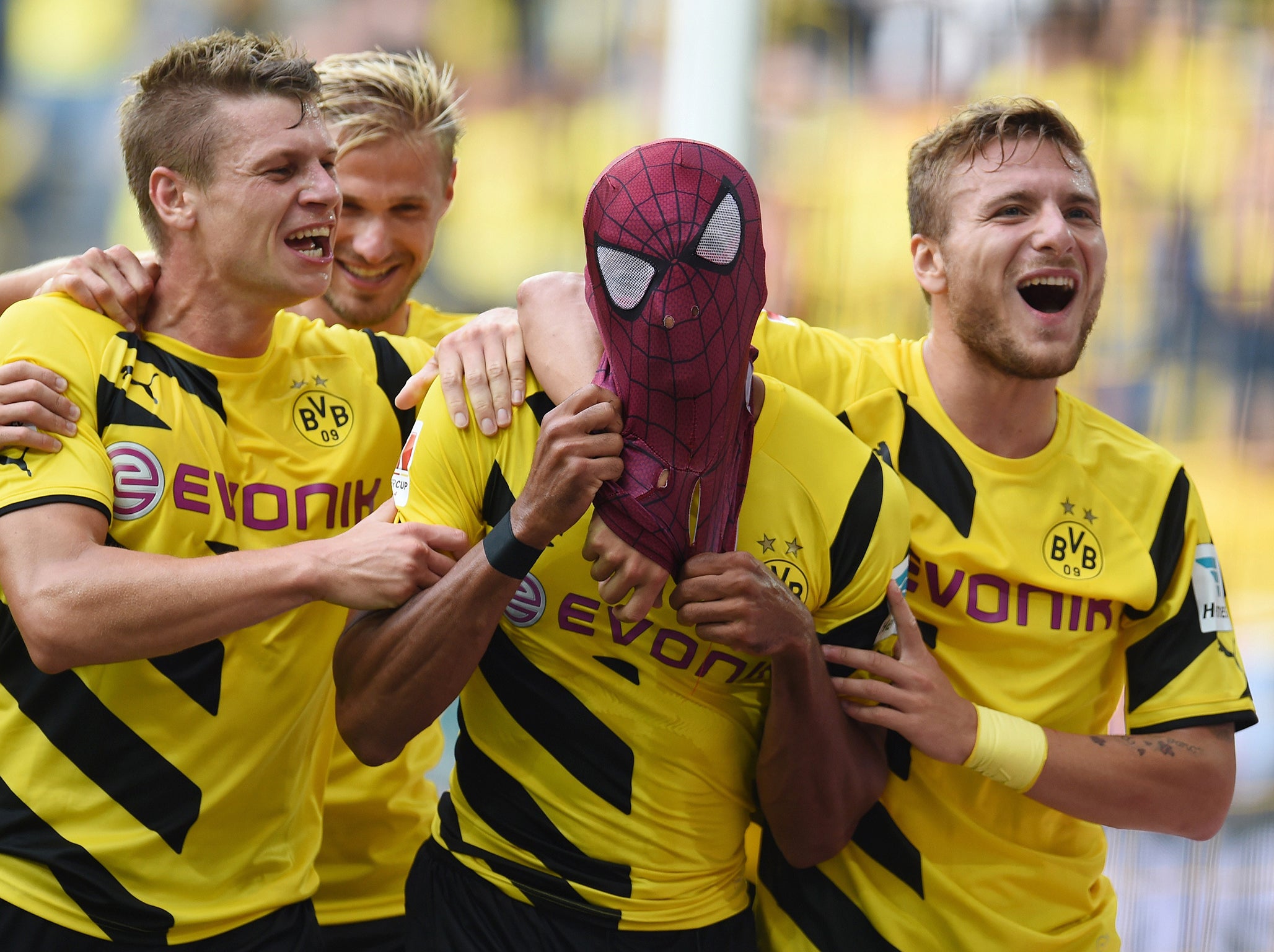 The striker celebrating with a Spiderman mask for Dortmund