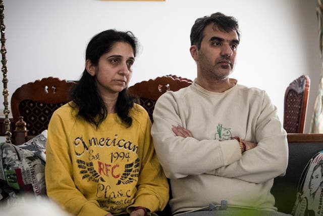 Manant Vaidya is joined by his wife Hiral, left, as he speaks about losing his two parents, sister, brother-in-law, and two young nieces in the crash of an Ethiopian Airlines jetliner 10 March 2019.