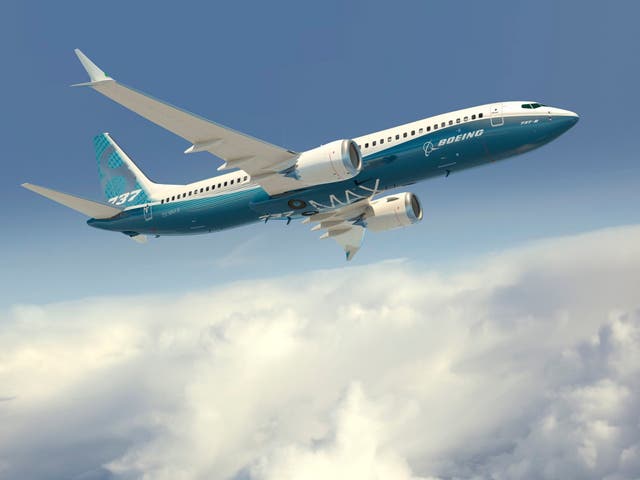 A 737 MAX 8 passenger plane in Boeing colours