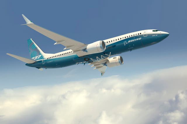 A 737 MAX 8 passenger plane in Boeing colours