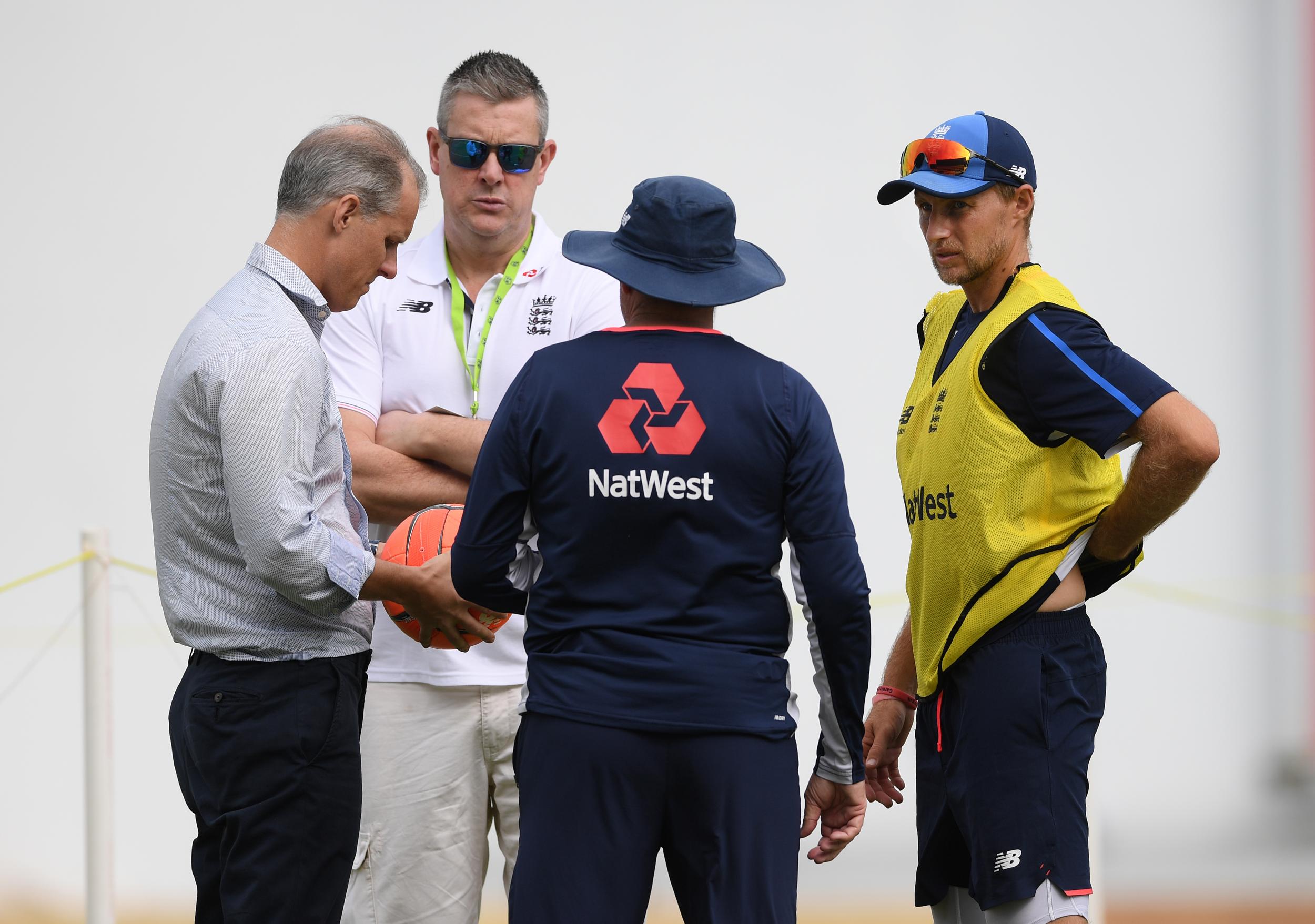 Joe Root talks with Trevor Bayliss, Ashley Giles and Ed Smith