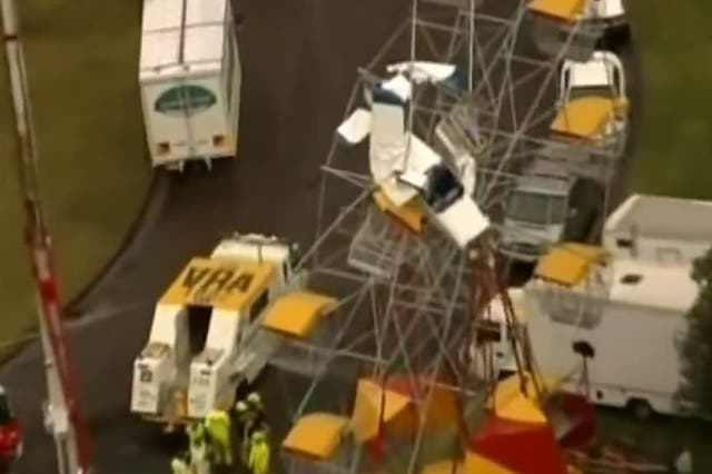 A small plane crashing into the Ferris wheel she's riding on at Australian funfair