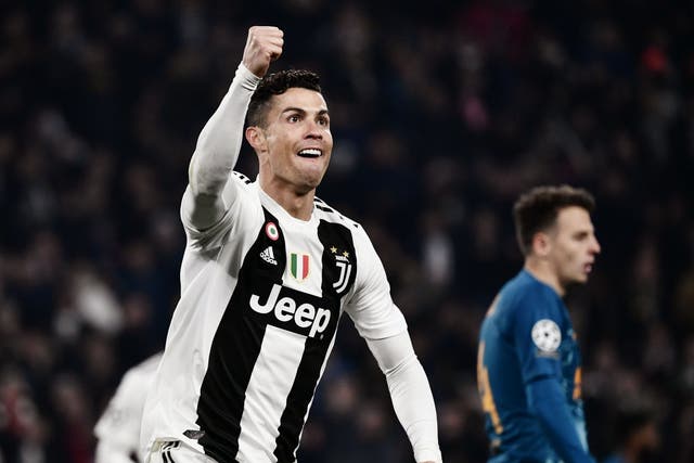 Cristiano Ronaldo celebrates scoring his second of the night