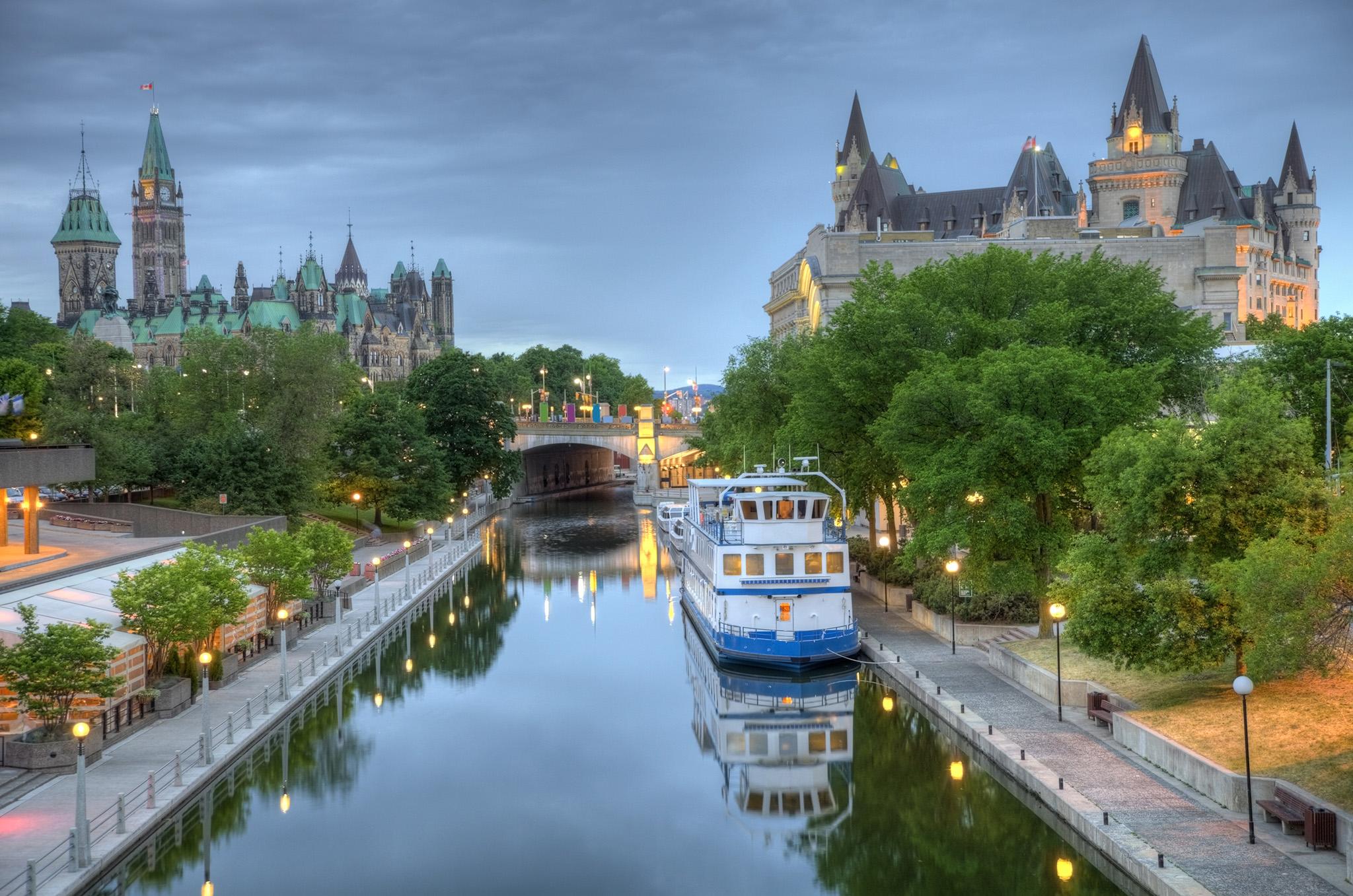 Parliament Hill along the banks of the Rideau Canal in Ottawa, Ontario