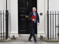 Hammond slashes growth forecast with no-deal Brexit warning
