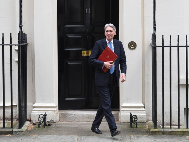 Chancellor Philip Hammond leaves 11 Downing Street as he heads to the House of Commons to deliver his March statement