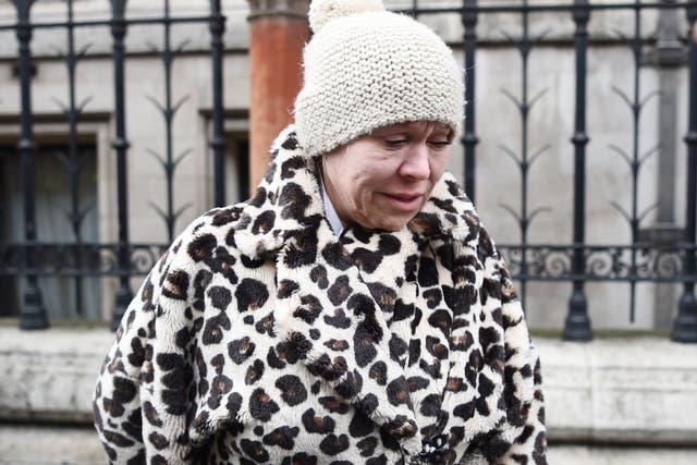 Actress Tina Malone leaves the High Court in London where she avoided jail