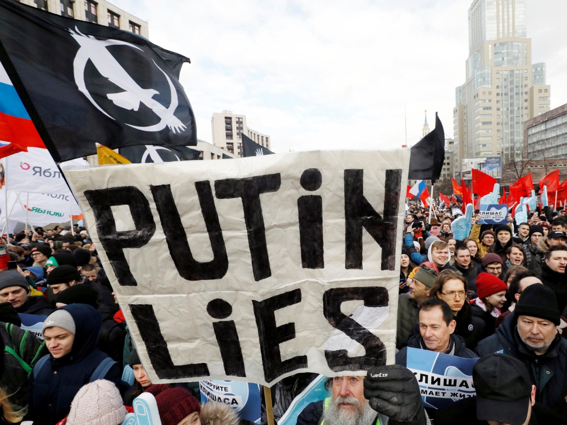 People attend a rally to protest against tightening state control over internet in Moscow
