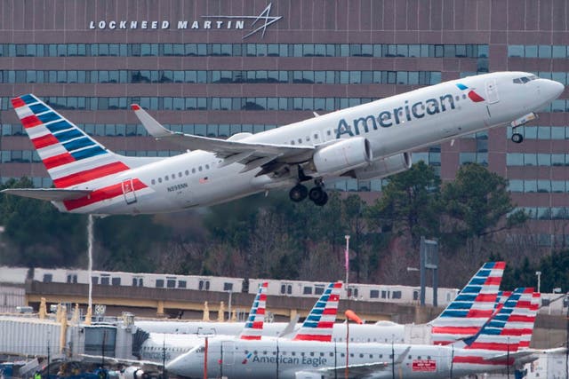 A flight attendant was bitten on the hand by an emotional support dog on an American Airlines flight