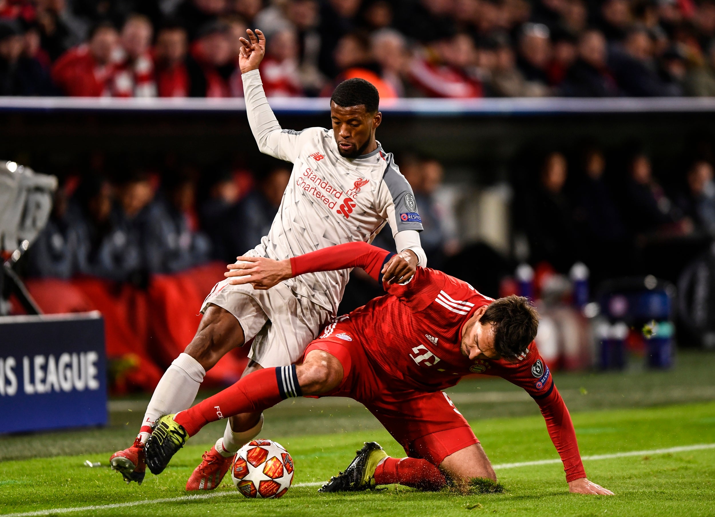 Wijnaldum challenges for the ball