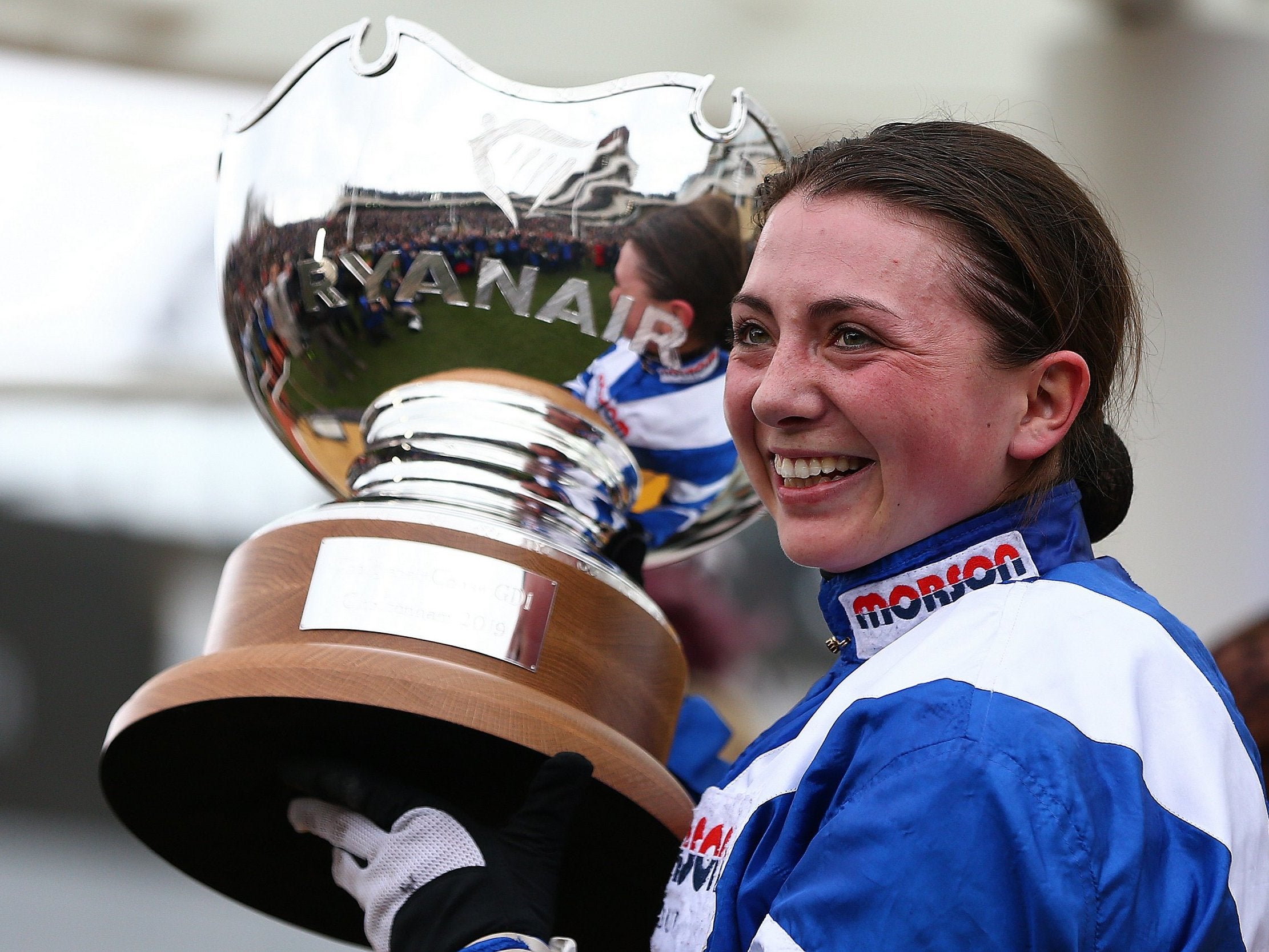 Bryony Frost celebrates with the trophy at Cheltenham