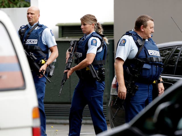 Armed police patrol outside a mosque in central Christchurch, New Zealand