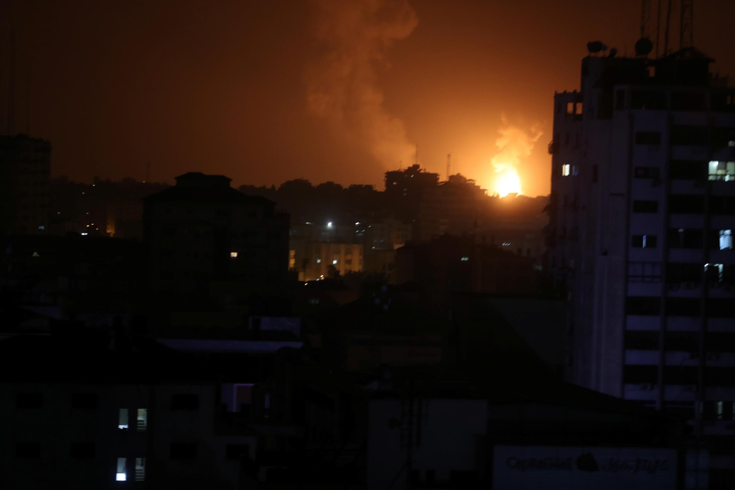 Smoke and flames are seen during an Israeli airstrike in Gaza on Friday (Mohammed Salem/Reuters)