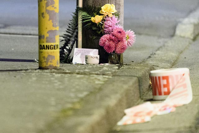A floral tribute is seen on Linwood Avenue near the Linwood Masjid on March 15, 2019 in Christchurch, New Zealand