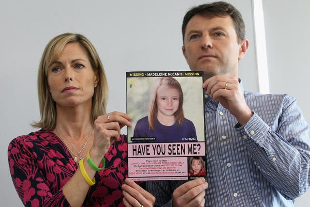 Kate and Gerry McCann hold an age-progressed police image of their daughter, Madeleine. They are not involved in the Netflix show