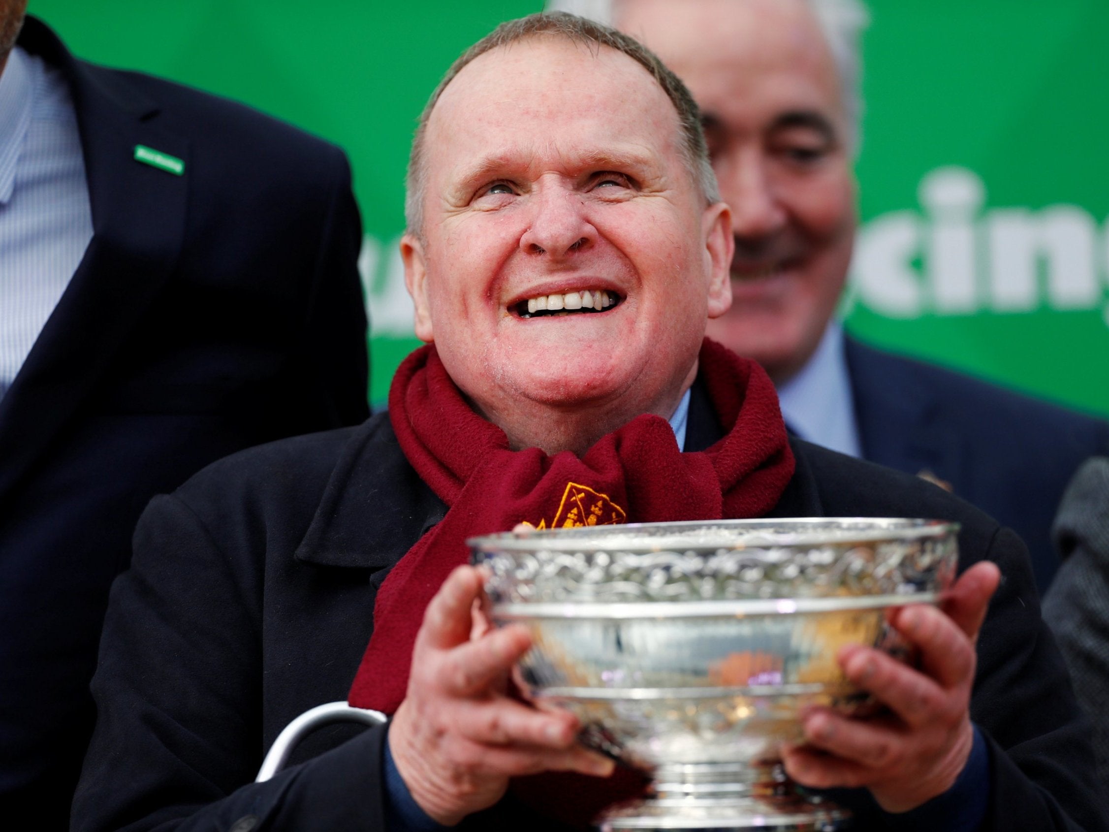 Owner Andrew Gemmell celebrates with a trophy