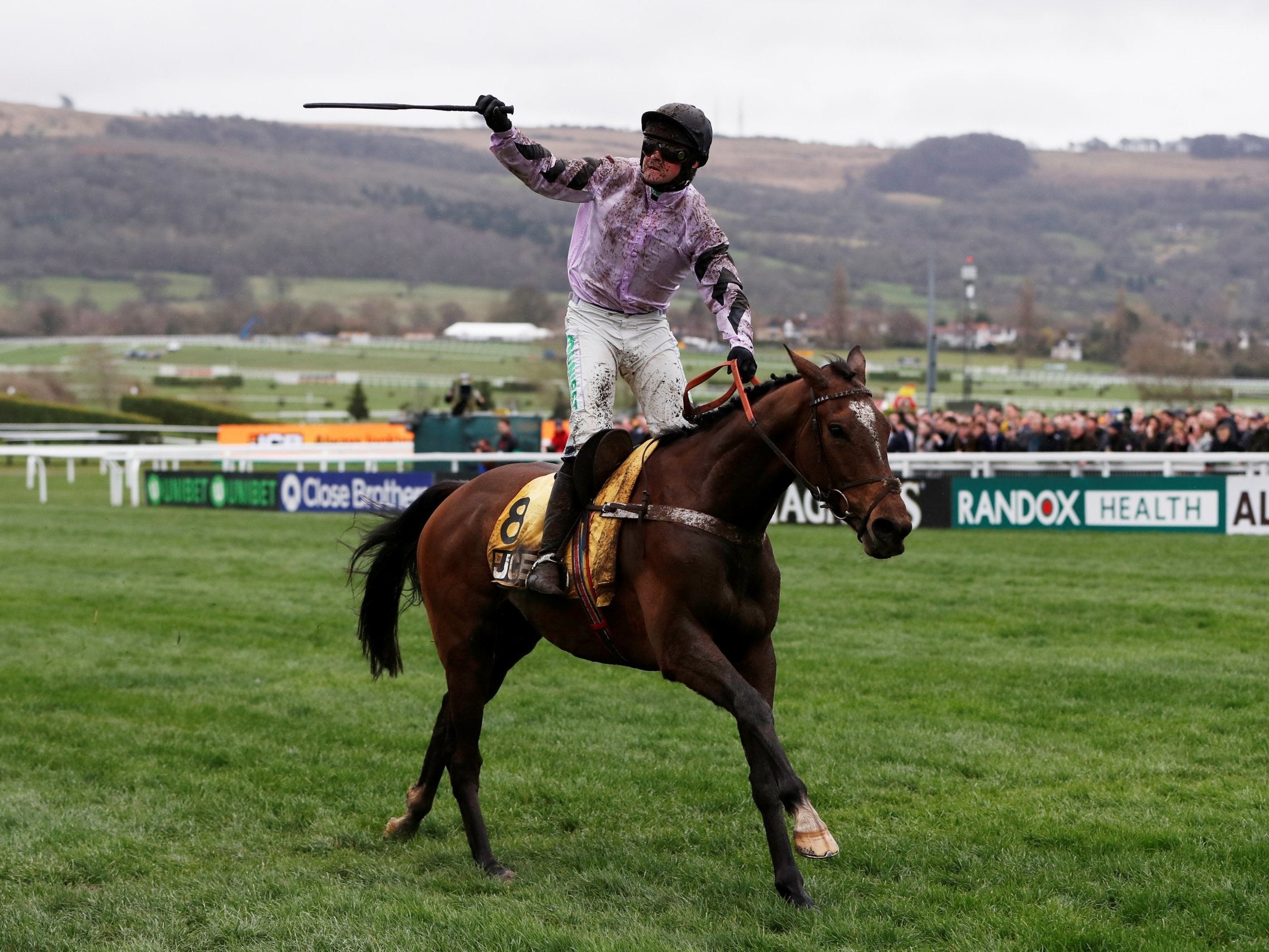 Nico de Boinville celebrates on Pentland Hills after winning an overshadowed JCB Triumph Hurdle ( Reuters)