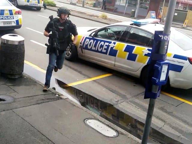 A police officer responds following shooting at Linwood in Christchurch