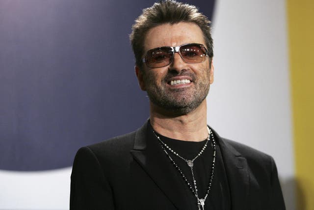 George Michael poses at the 'George Michael: A Different Story' photocall during the 55th annual Berlinale International Film Festival on 16 February, 2005 in Berlin, Germany.