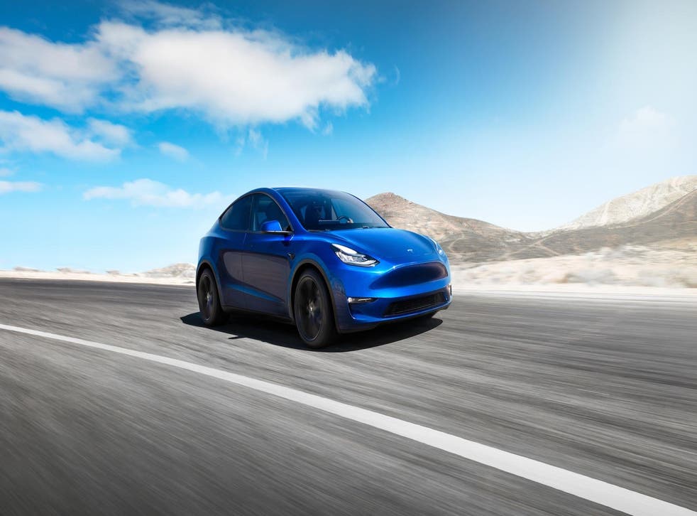 A handout photo dated 07 March 2019 and  made available 15 March 2019 by US automobile manufacturer Tesla, showing the new Tesla Model Y electric car that Tesla says will be released as of from 2020