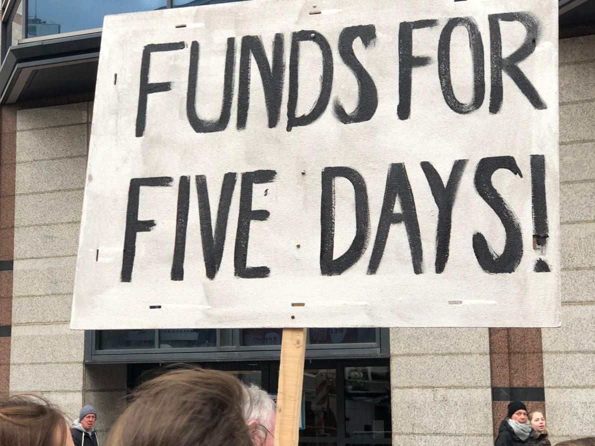 Parents protest outside a conference in Birmingham where education secretary Damian Hinds was speaking to call for more school funding