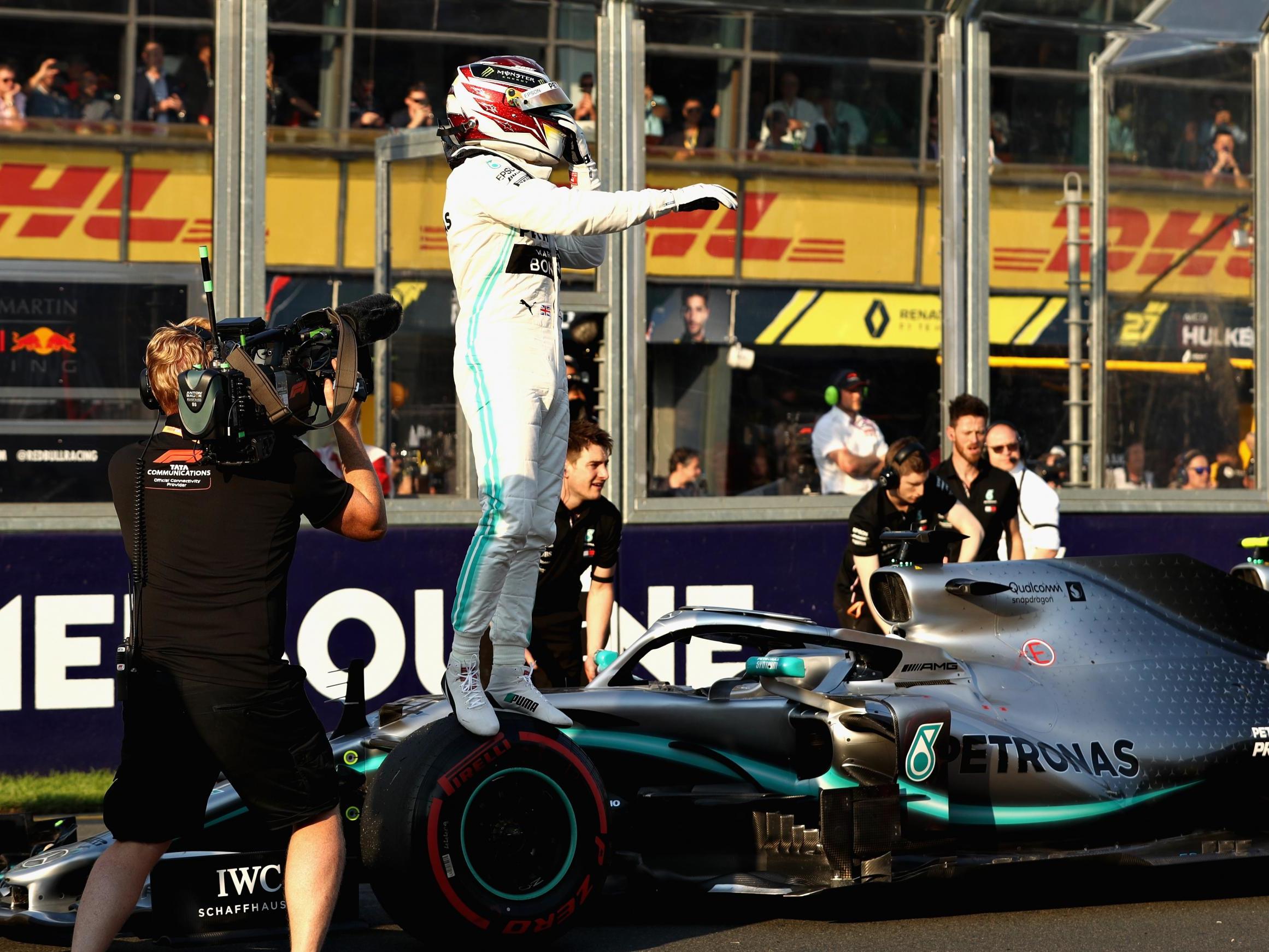 Lewis Hamilton celebrates taking pole position for the Australian Grand Prix in Melbourne