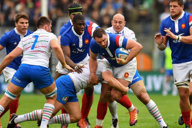 France's Louis Picamoles is tackled