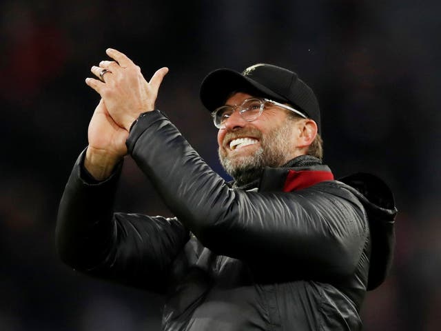 Liverpool manager Juergen Klopp applauds the fans