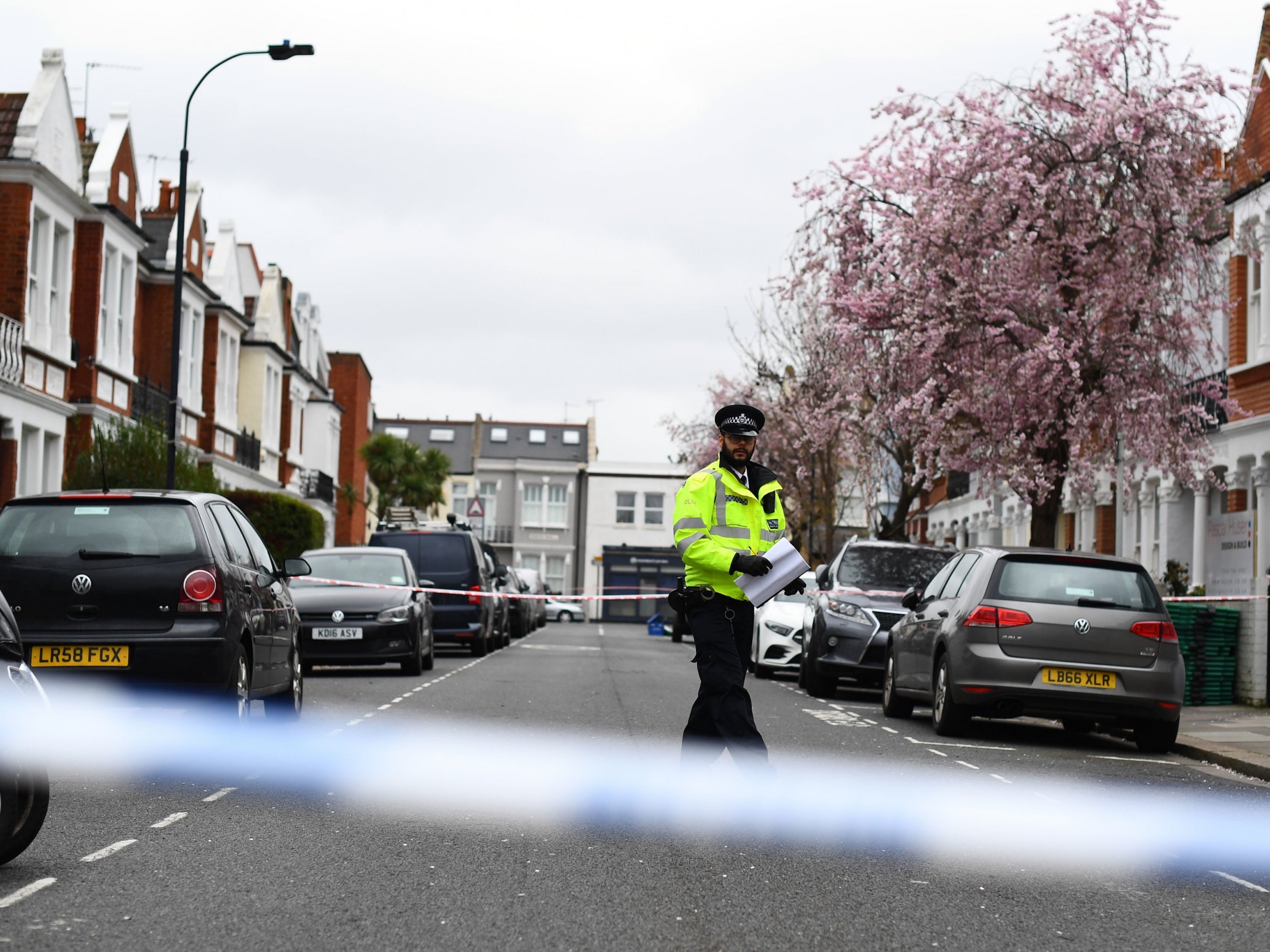 Police at the scene in Fulham, west London, where Nathaniel Armstrong was stabbed to death