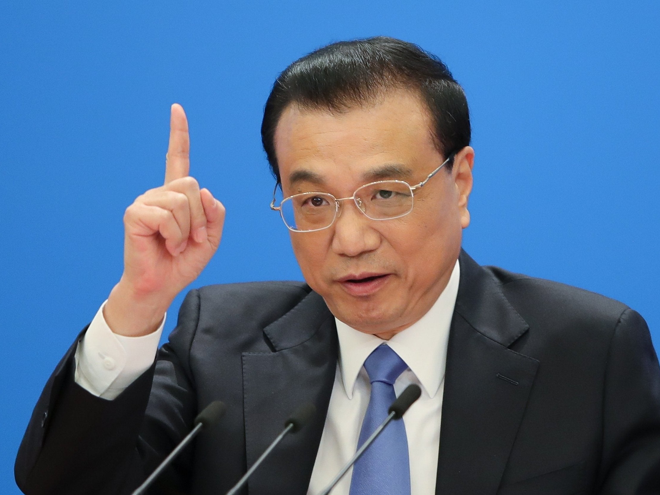 China's Premier Li Keqiang speaks during a news conference following the closing of the second session of the 13th National People's Congress