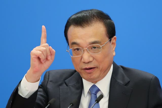China's Premier Li Keqiang speaks during a news conference following the closing of the second session of the 13th National People's Congress