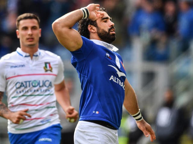 Yoan Huget celebrates scoring France's second try against Italy