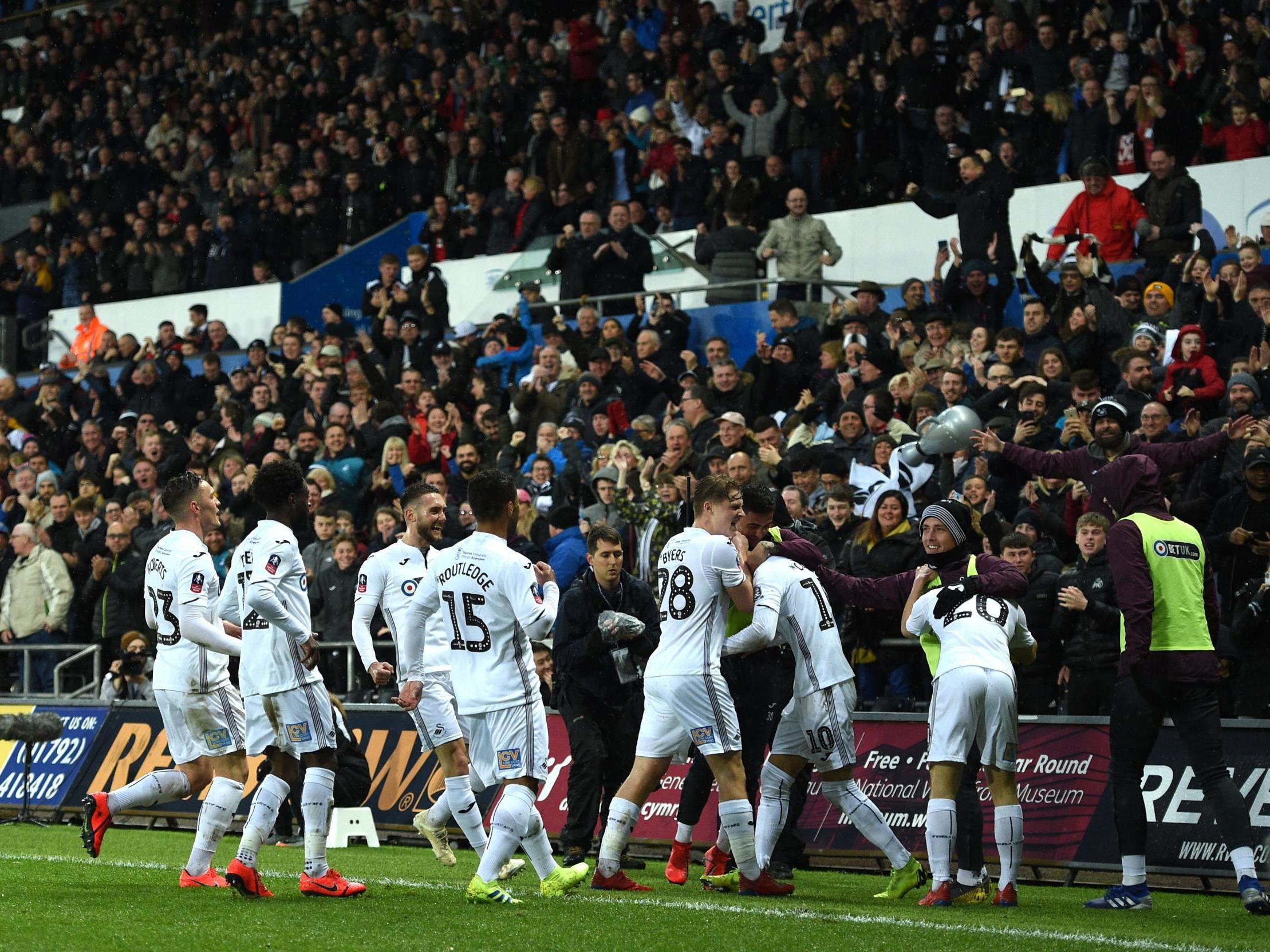 Bersant Celina celebrates scoring Swansea's second goal following a brilliant passage of play
