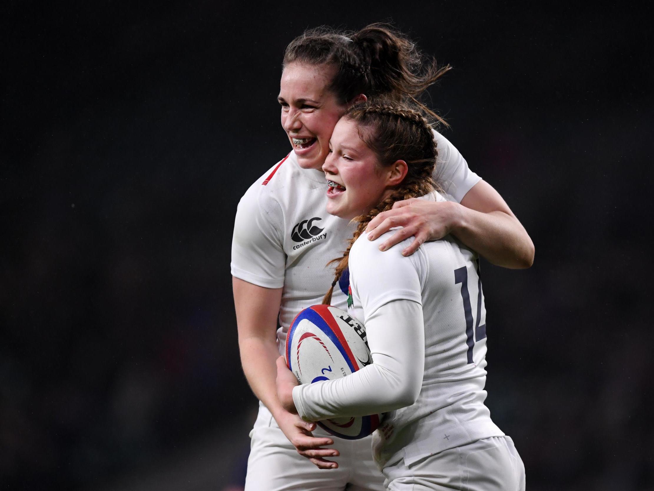 Jess Breach celebrates scoring England’s fourth try of the match