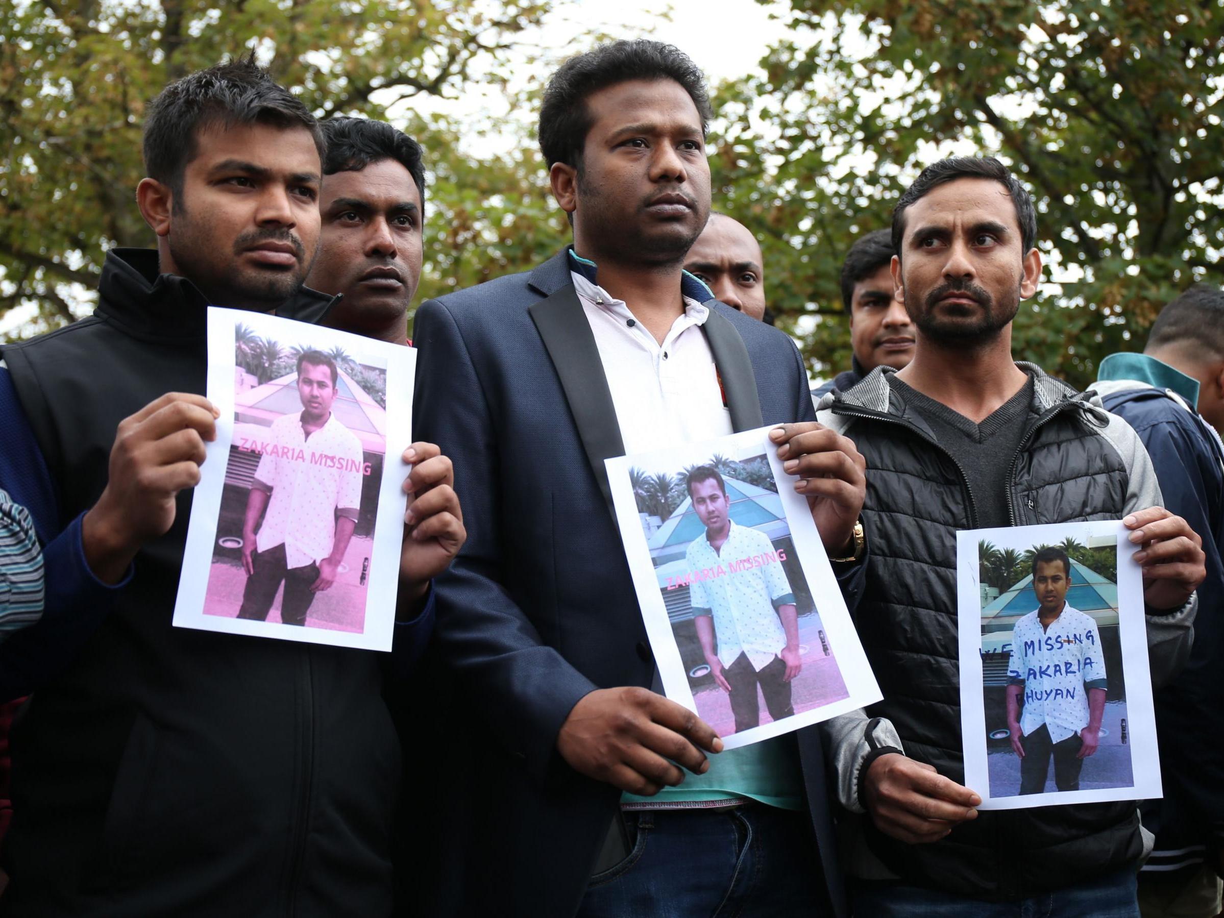 People gather hoping to find out information about Zakaria Bhuiyan who is still missing after the mosques shootings in Christchurch.