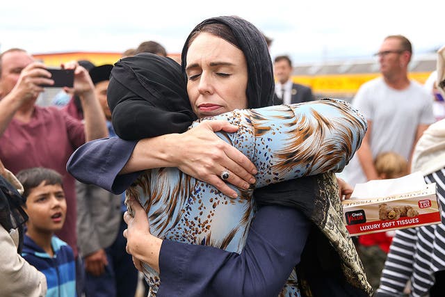 Jacinda Ardern hugs a worshipper at the Kilbirnie Mosque in Wellington, New Zealand.