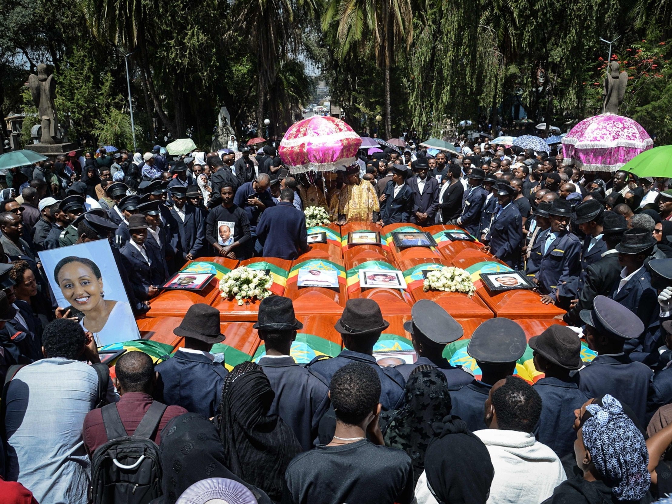 Coffins of victims of the crashed accident of Ethiopian Airlines are gathered during the mass funeral at Holy Trinity Cathedral in Addis Ababa, Ethiopia, on 17 March 2019.
