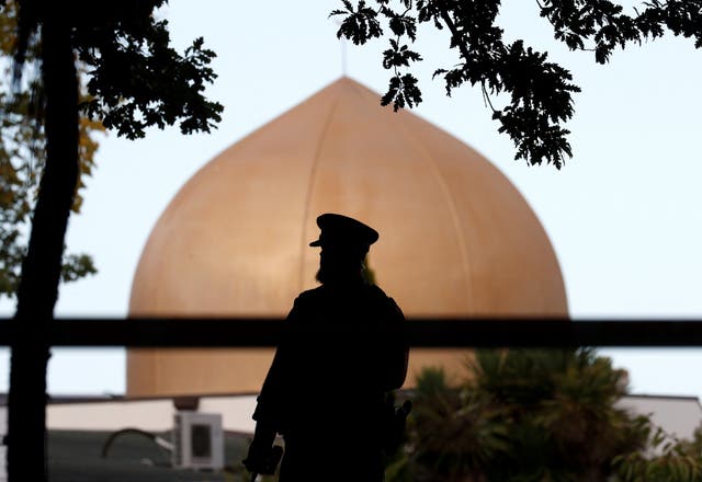 A police officer stands outside Masjid Al Noor mosque in Christchurch