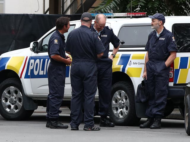 Police at Christchurch Hospital in New Zealand, where staff are still treating 34 people wounded in the attacks