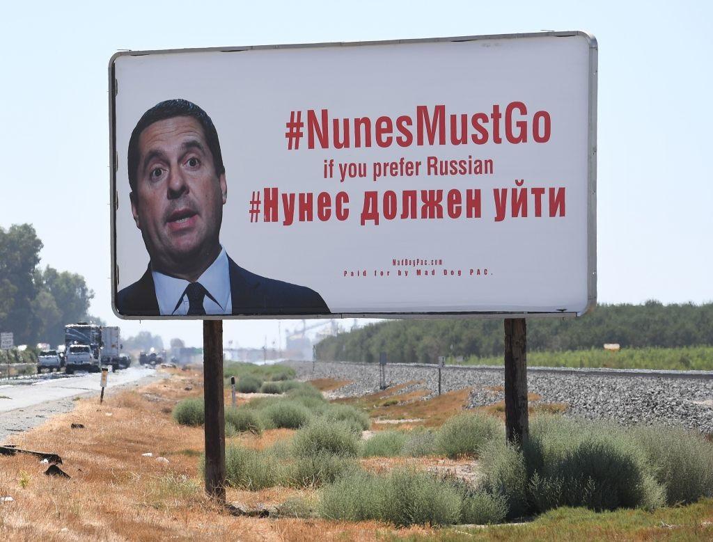A billboard showing Republican Devin Nunes with social media hashtags related to the investigation into Russian election meddling