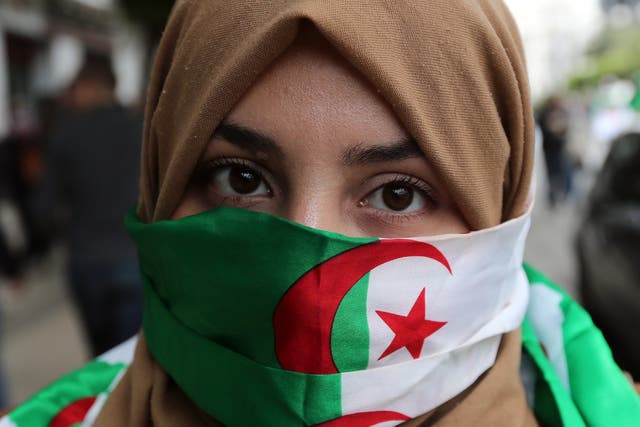 An Algerian protests against President Abdelaziz Bouteflika's continued reign in Algiers on Tuesday
