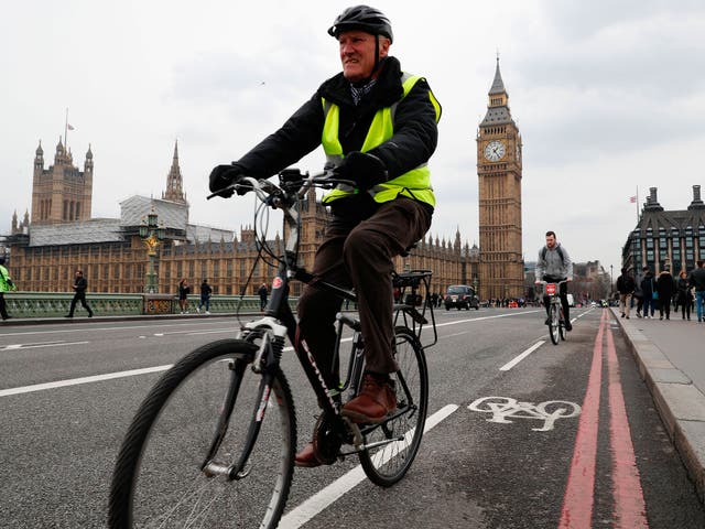 A cyclist crossing Westminster Bridge