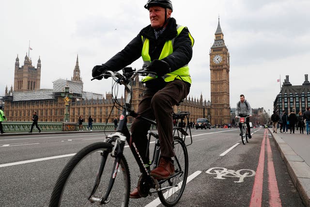 A cyclist crossing Westminster Bridge
