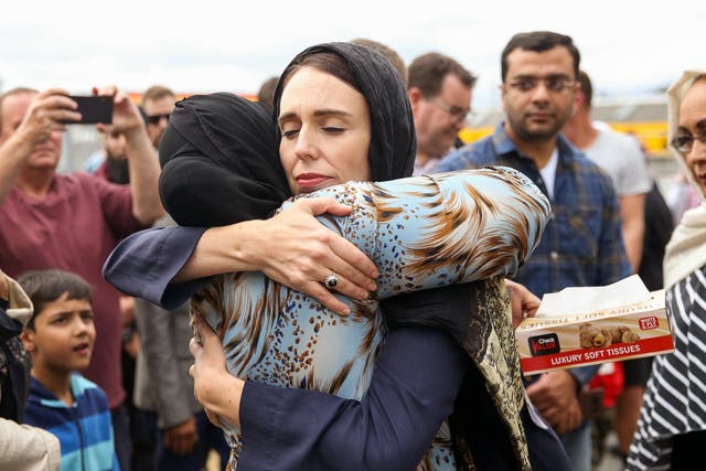 New Zealand prime minister Jacinda Ardern hugs a mosque-goer at the Kilbirnie Mosque on 17 March 2019 in Wellington, New Zealand.